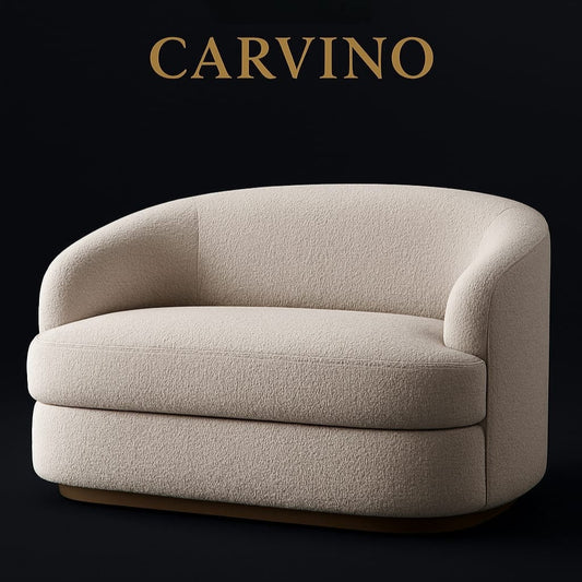 Beige armchair on a black background with 'CARVINO' branding.